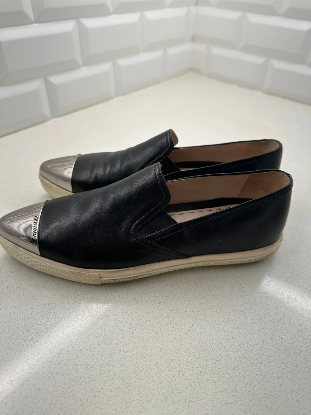 Miu Miu Black Leather Slip-On Flats with Silver Cap Toe